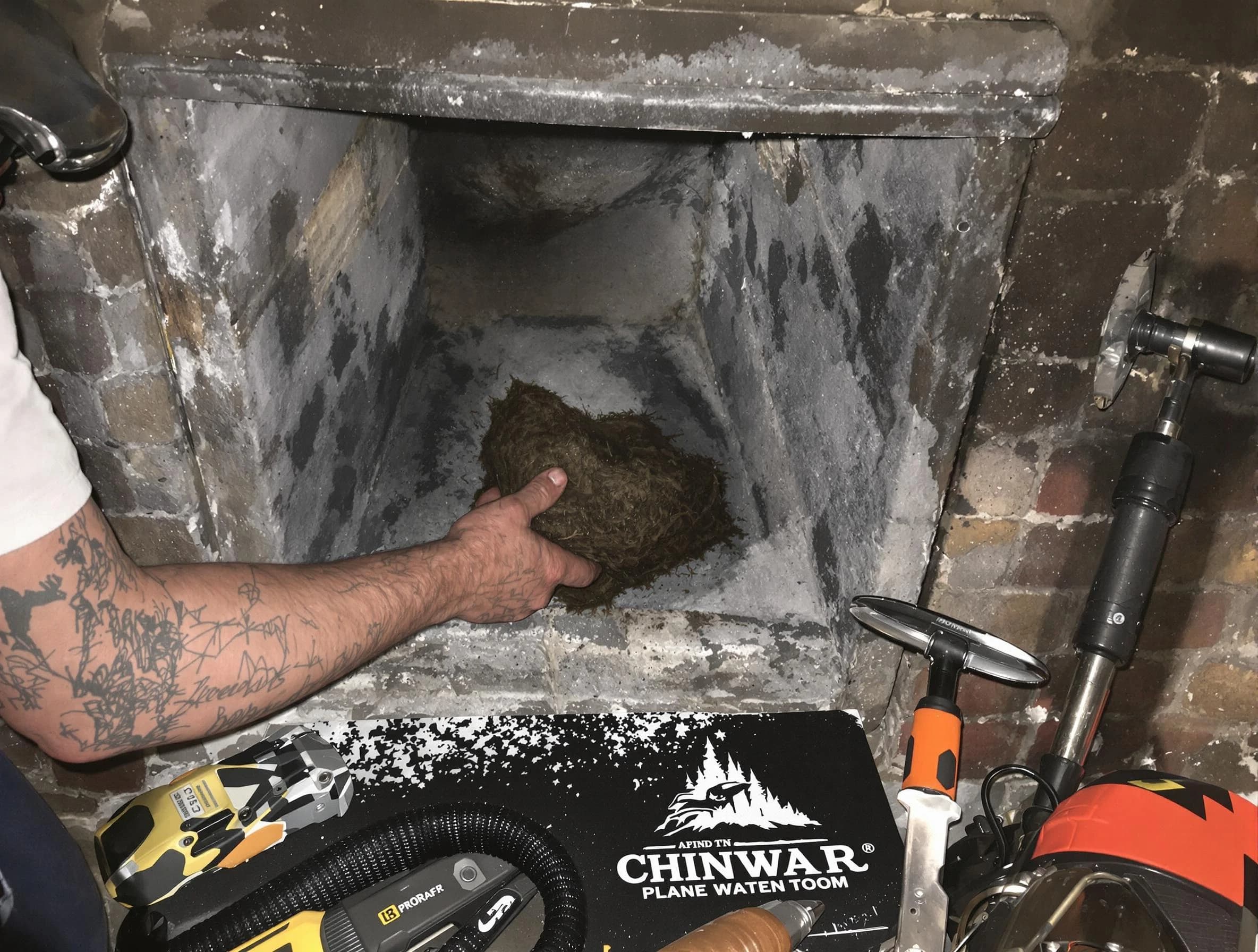 Erie Chimney Sweep safely removing debris and screening chimney in Erie, CO