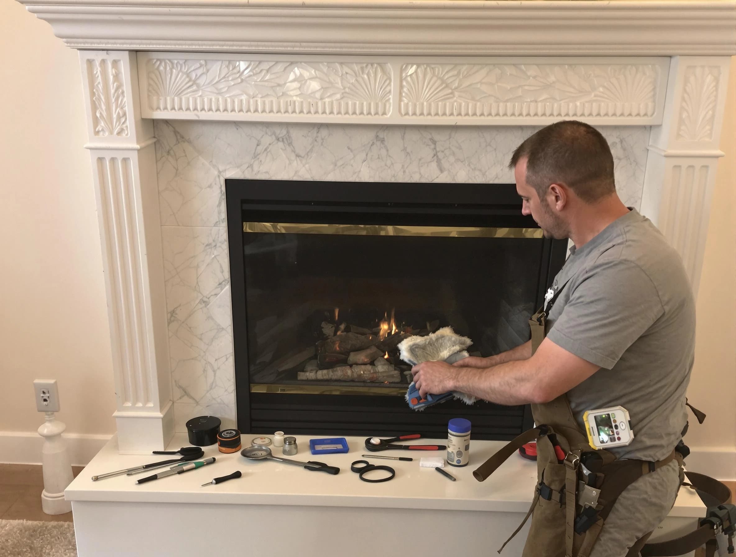 Erie Chimney Sweep performing fireplace maintenance in Erie, CO